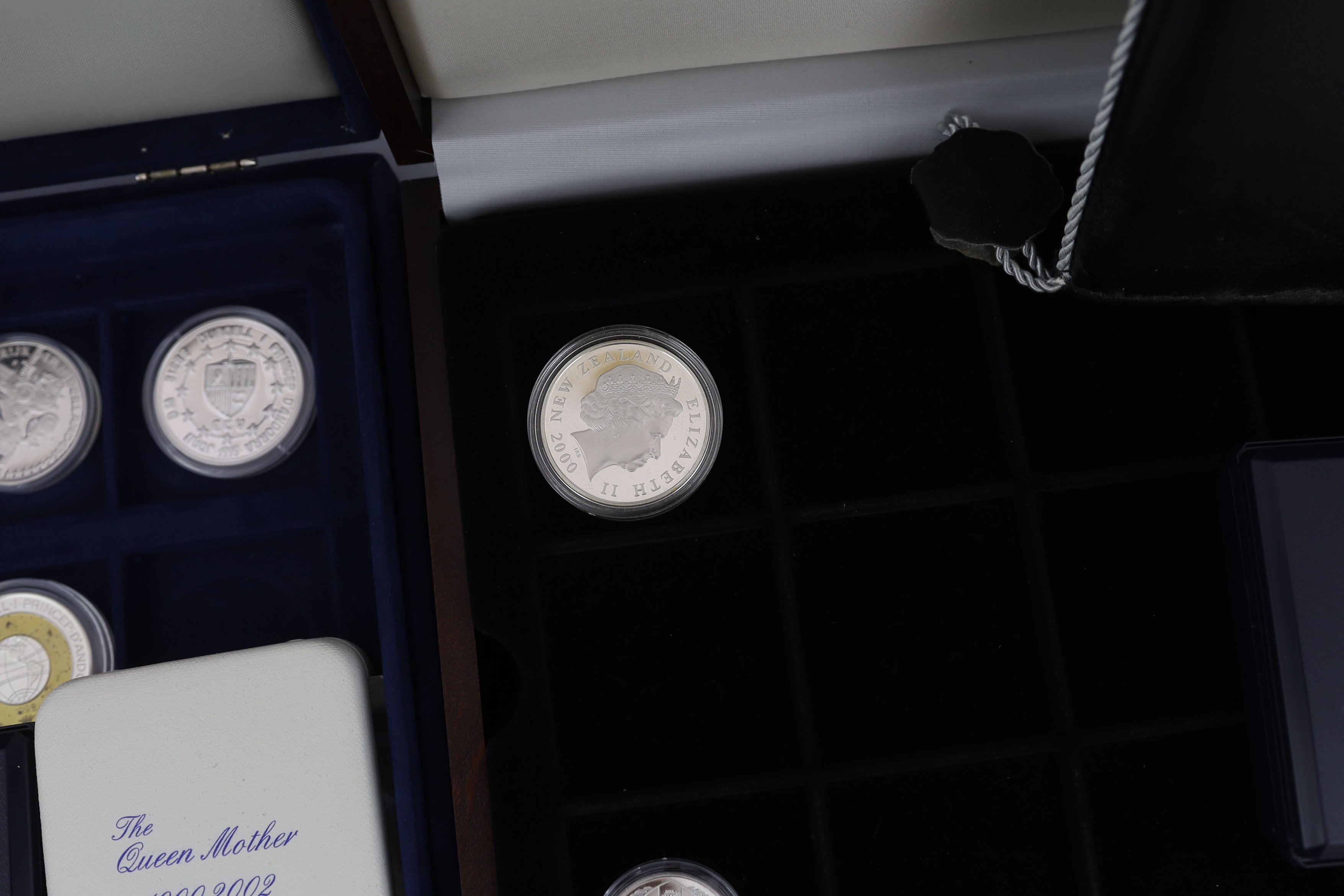 QEII proof silver coins, and ECU coins, many commemorating the Queen mother including Georgia and South Sandwich Islands 2006 two pounds , Isle of Man 2006 one crown , Royal Australian Mint 2002 five dollars , Queen Eliz